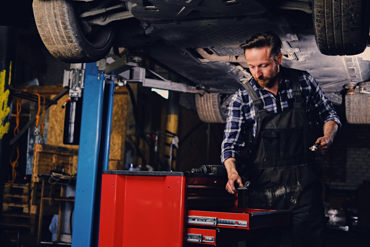 mechanic getting tools out of his tool box